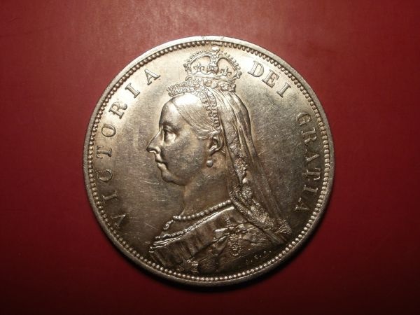 Die-Error-By-Earring-On-Obverse-Of-1887-Half-Crown?
